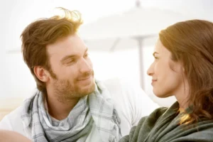 bigstock Young couple sitting on summer 17483603