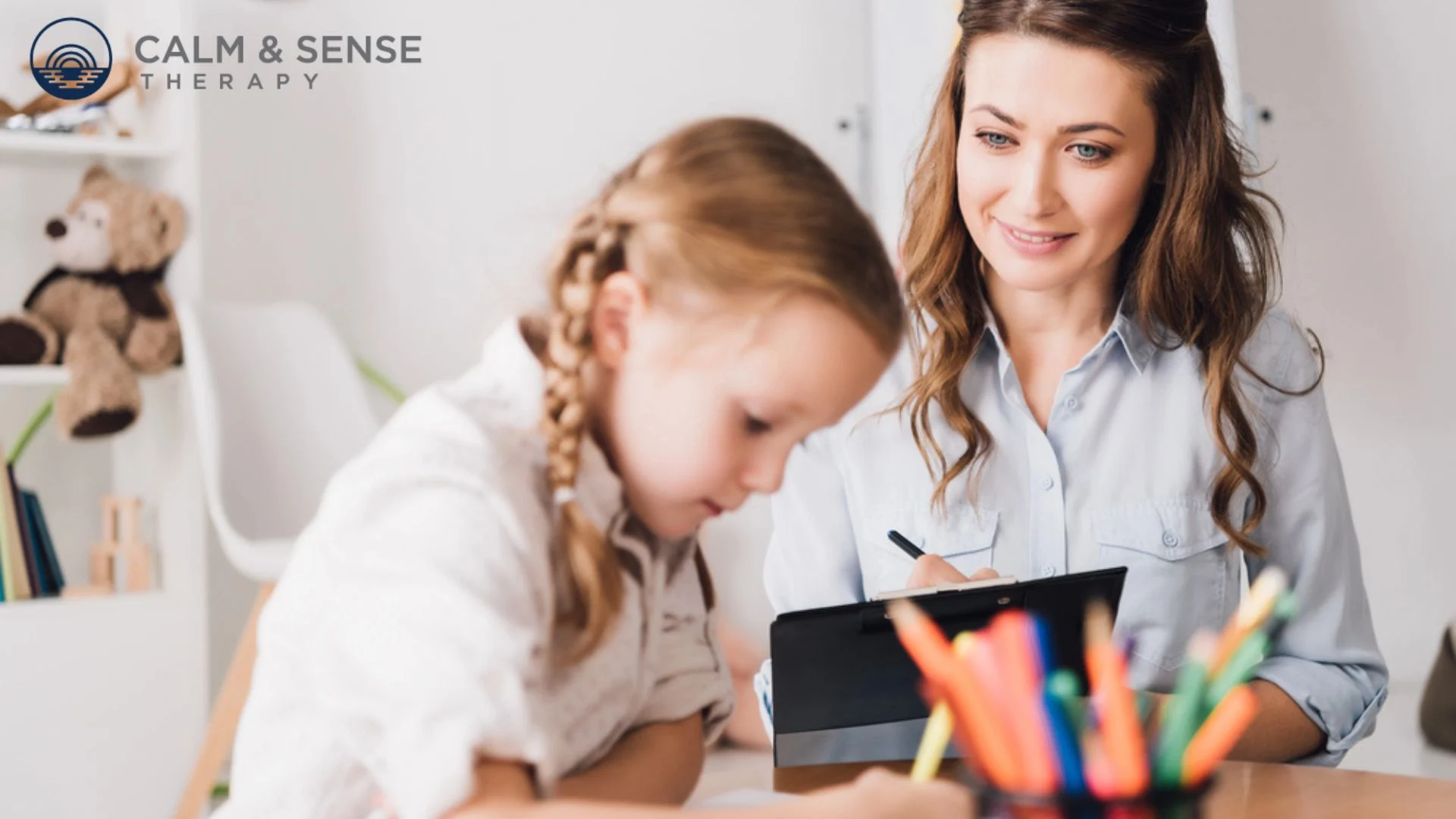 Young child participating in Art Therapy after a loss of a parent.