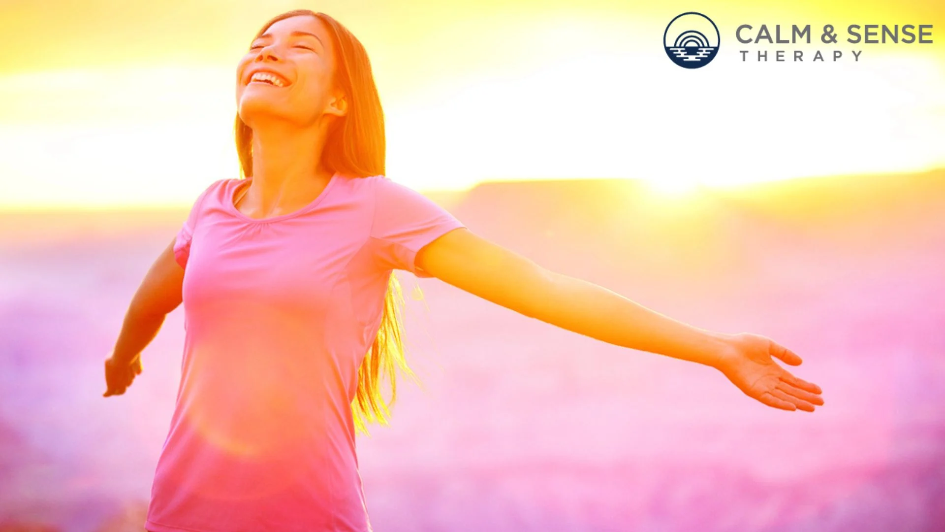 Woman expressing freedom newly found freedom by a young woman after attending therapy for depression that was leading her to drink