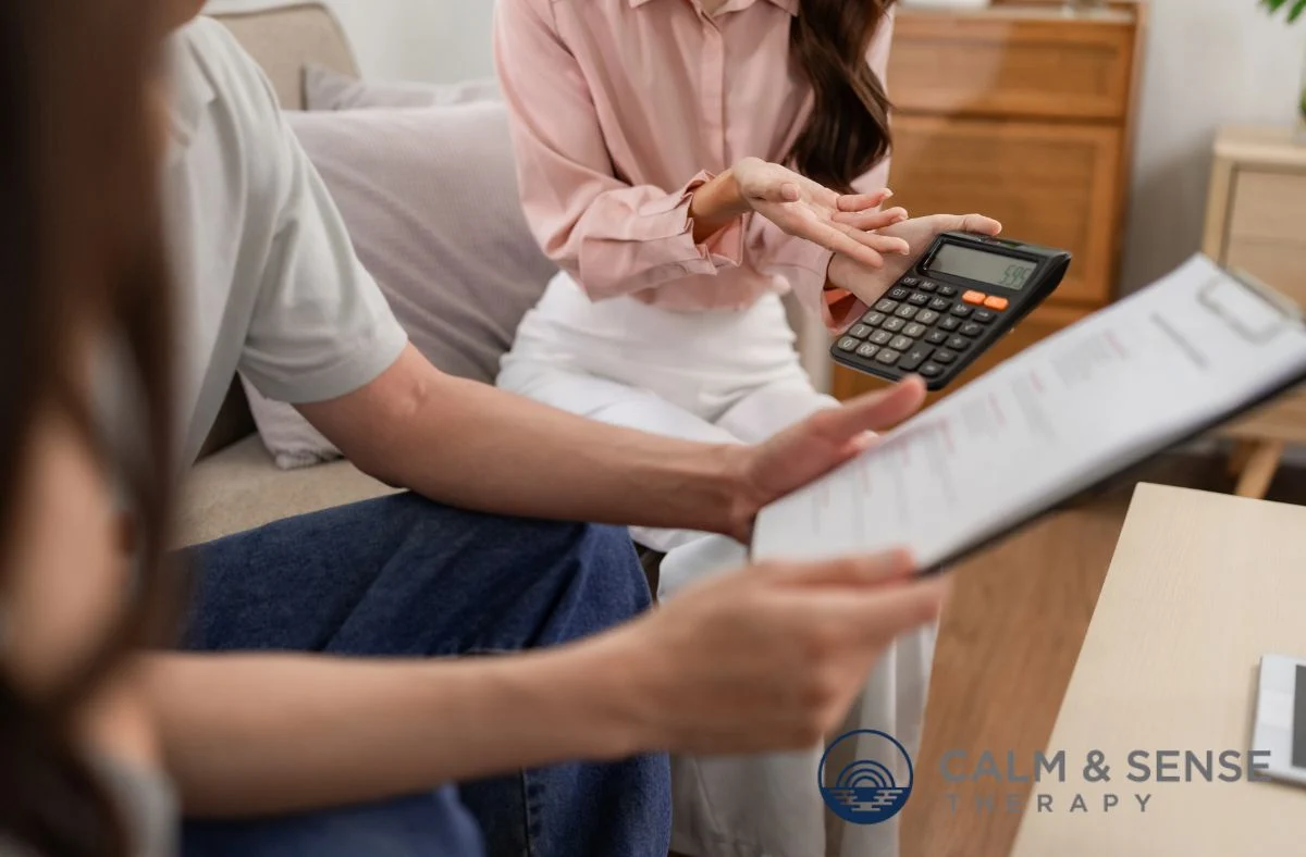 Experienced counselor reviewing mental health benefits with a client, explaining how coverage varies by insurance plan while ensuring accessible therapy options across New Jersey