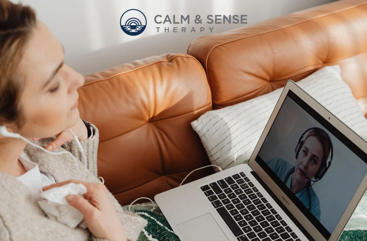 Teen participating in virtual session in New Jersey using online resources and dialectical behavior therapy to reduce self-harm behaviors and build healthier coping strategies.